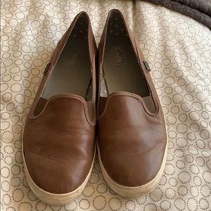 Brown leather keds